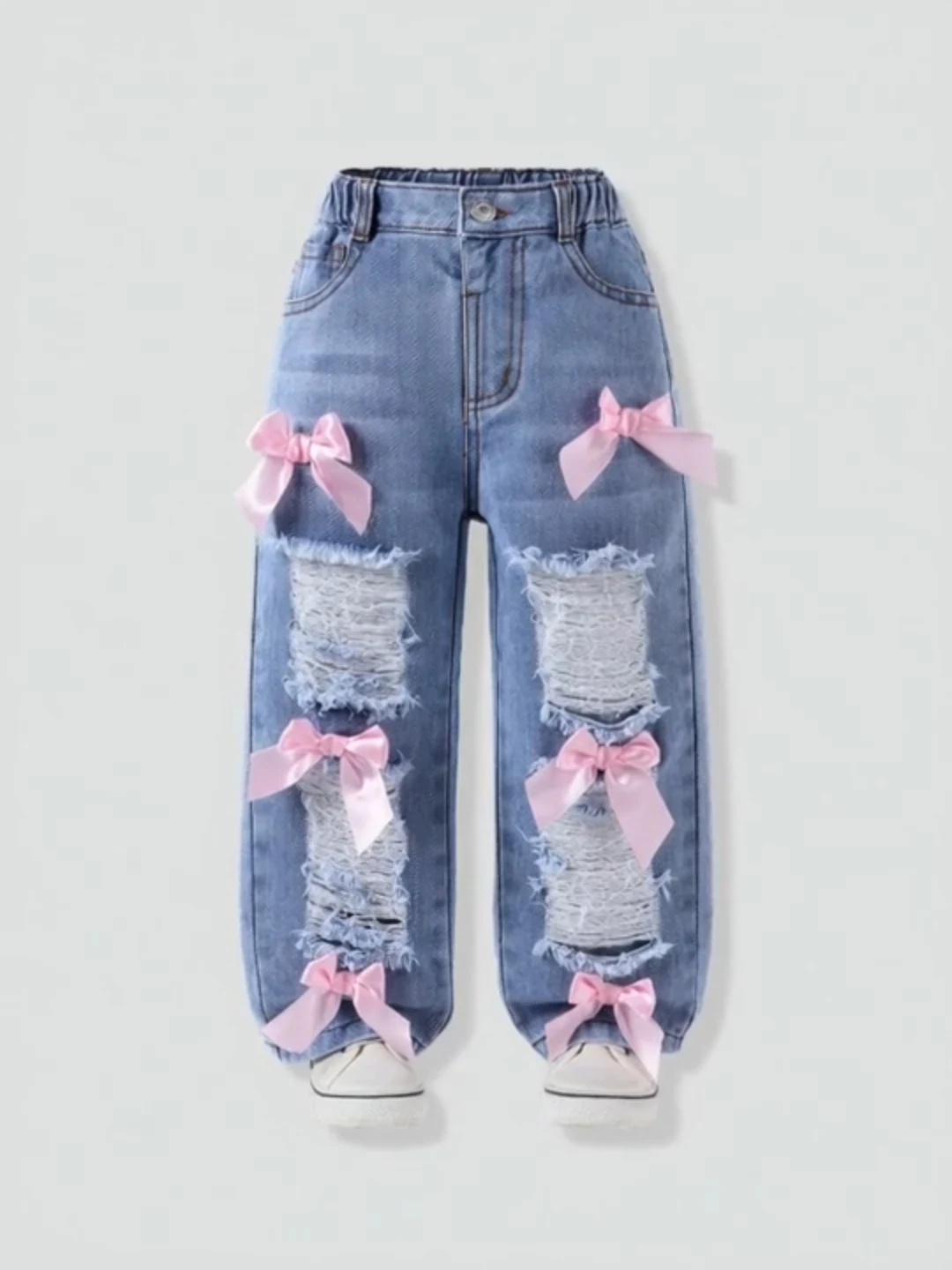 Pantalón azul con lazos rosas para niña